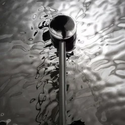 Applique verre moderne – disque argenté effet vague CALERA