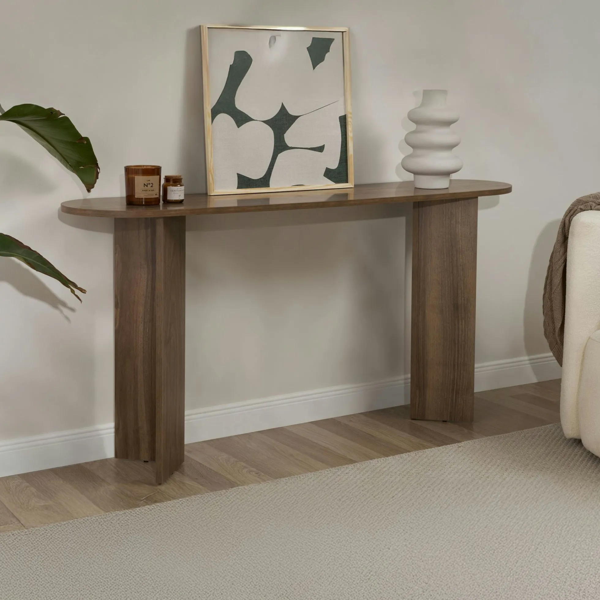 Console de salon ovale effet noyer foncé - pieds en V MARFA