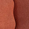 Fauteuil arrondi tissu bouclettes terracotta MALMOE