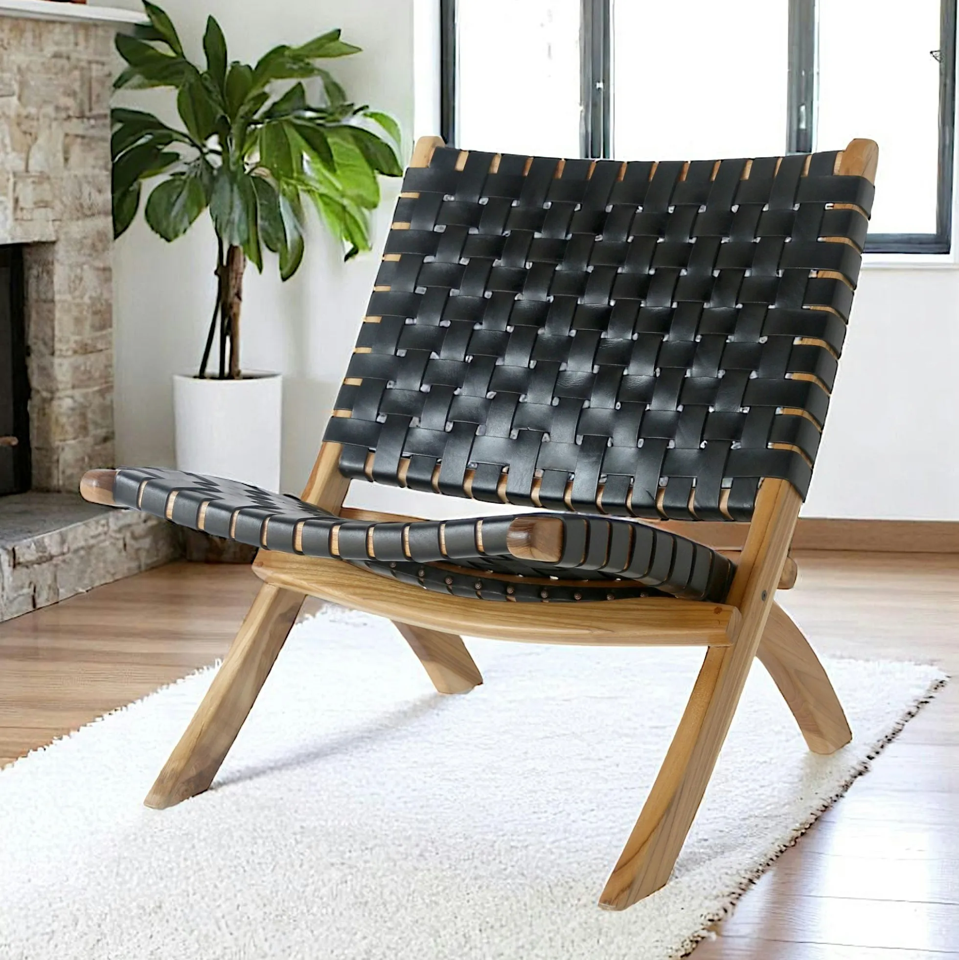 Fauteuil en cuir noir et bois de teck MENDOZA
