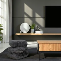 Pouf pivotant gris foncé effet coussins empilés IENA
