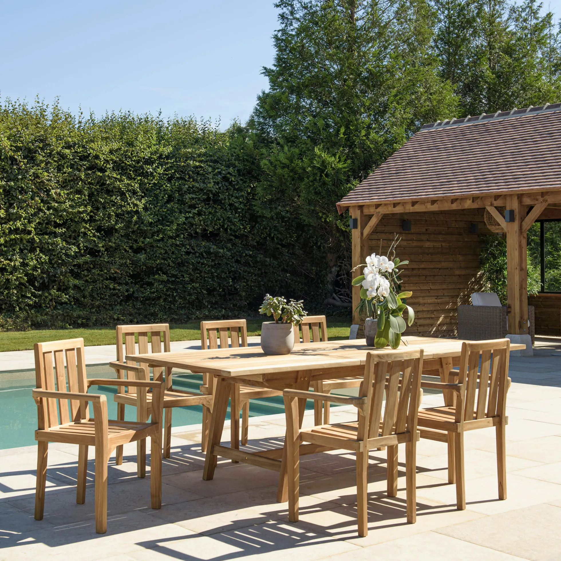 Salon de jardin teck brut table pieds tréteaux 180/240 + 6 fauteuils SUMMER