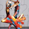 Statuette en métal peint danseurs