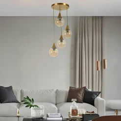 Suspension moderne dorée 4 globes verre ambré SIERRE