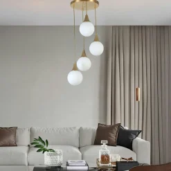 Suspension moderne dorée 4 globes verre dépoli SIERRE