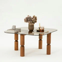 Table basse carrée en verre fumé - pieds bois marron sculpté BOMA