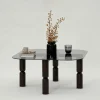 Table basse carrée en verre fumé - pieds bois sculpté BOMA