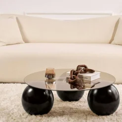 Table basse ronde verre ambré - 3 pieds boules noirs KOCHI