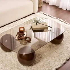 Table basse verre ambré bords arrondis 4 pieds boule KOCHI