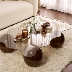 Table basse verre ambré design organique 4 pieds boule KOCHI