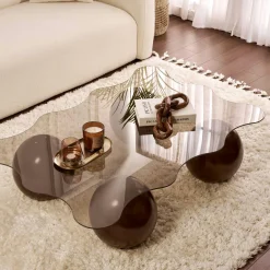 Table basse verre ambré design organique 4 pieds boule KOCHI