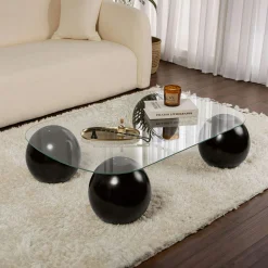 Table basse verre bords arrondis - 4 pieds boules noirs KOCHI