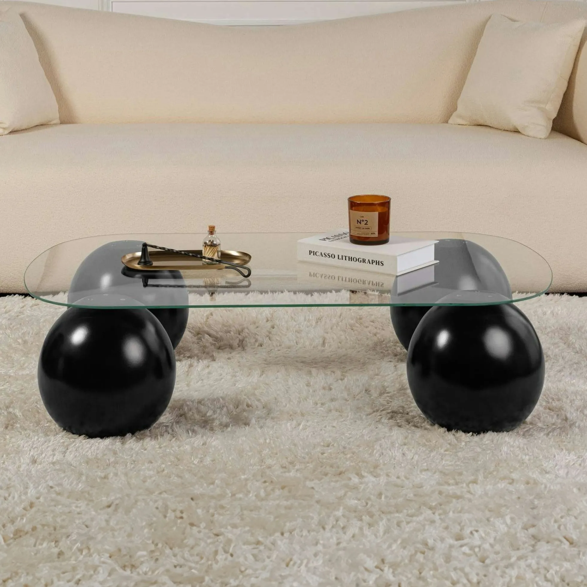 Table basse verre bords arrondis - 4 pieds boules noirs KOCHI