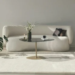 Table basse verre fumé minimaliste, galet et pied doré TULUM