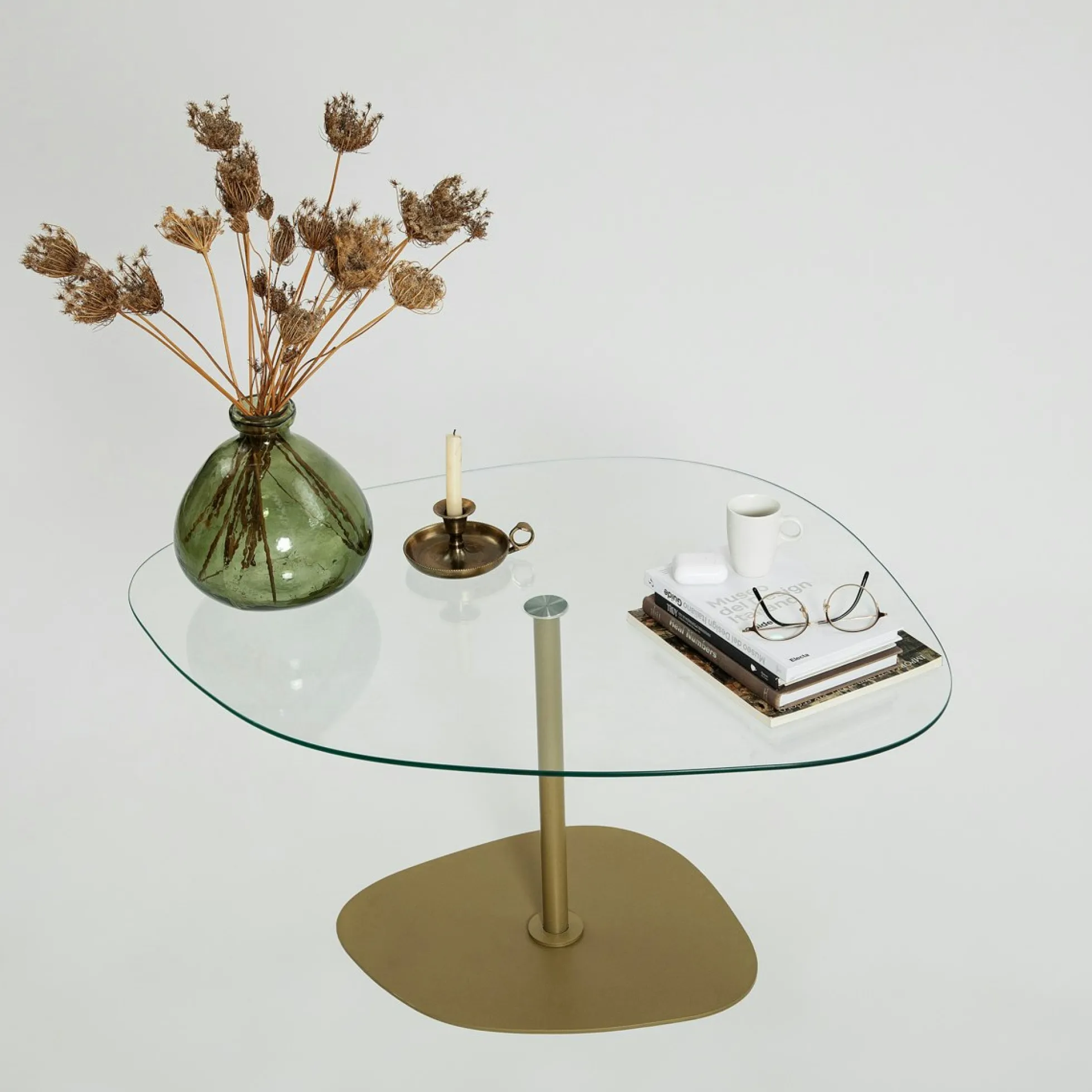 Table basse verre minimaliste forme galet et pied doré TULUM