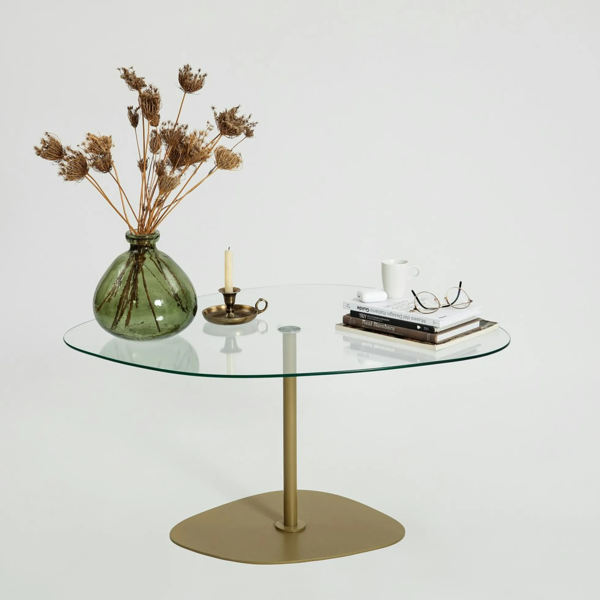 Table basse verre minimaliste forme galet et pied doré TULUM